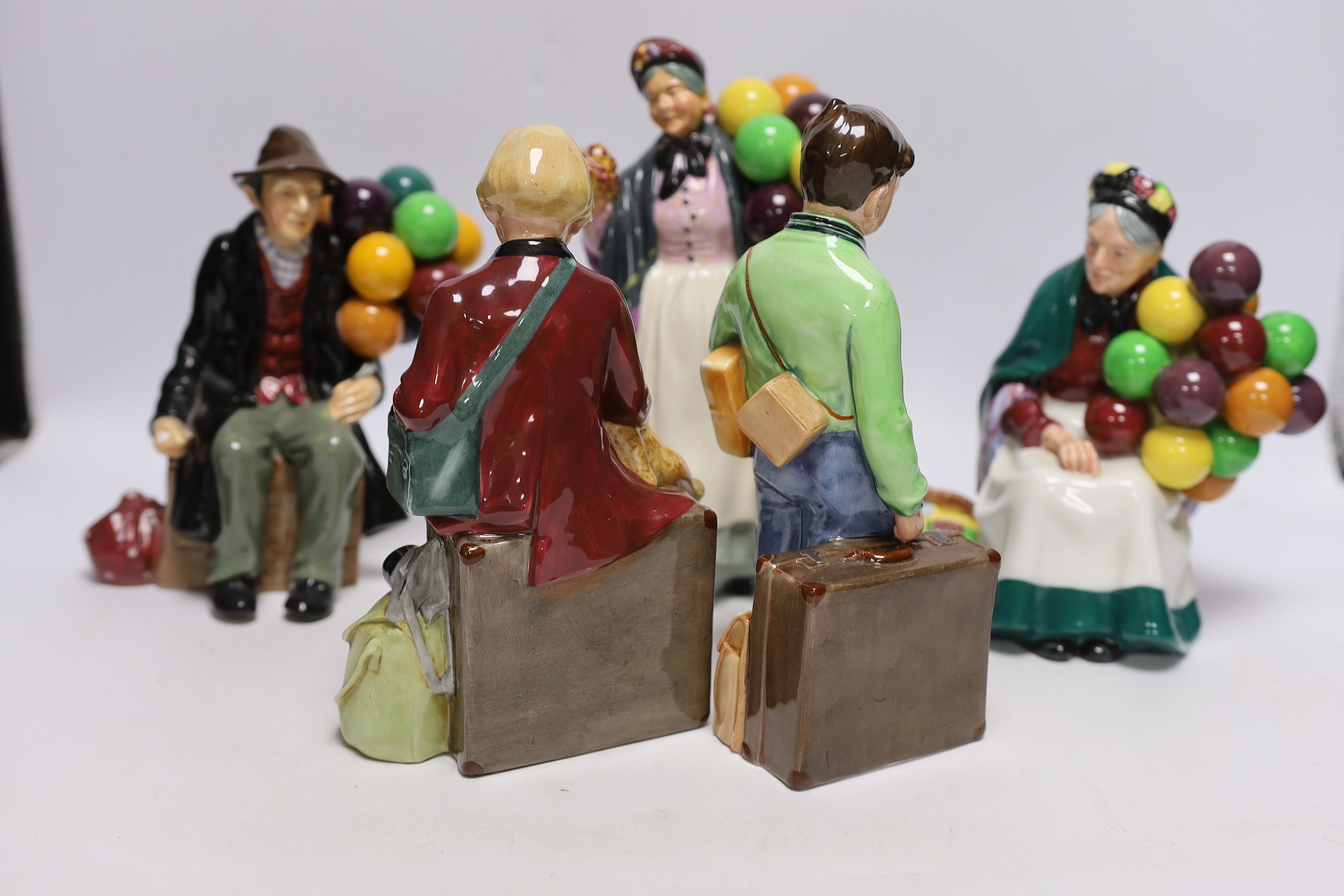 Royal Doulton figures: 'Girl Evacuee' and 'Boy Evacuee', 'The Old Balloon Seller', 'The Balloon Man', 'Diddy Penny Farthing', tallest 23cm high